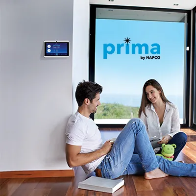 prima diy security photo of couple in appartment with logo